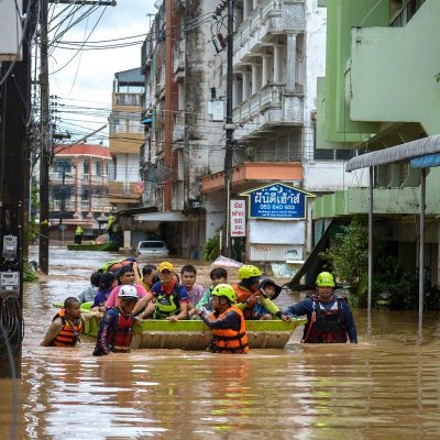 Unprecedented Water Levels After Record Rainfall Submerge a Thai City Street